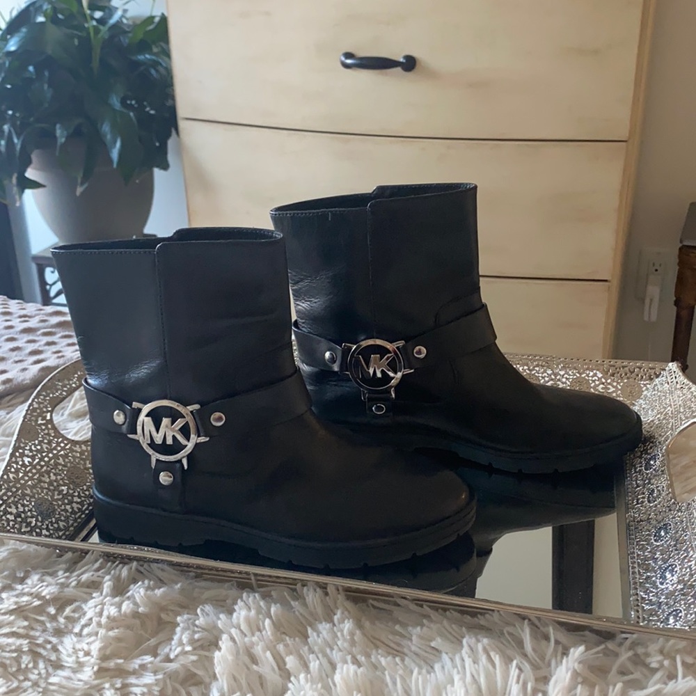 Michael Kors leather pull on black ankle boot with silver Logo initials.